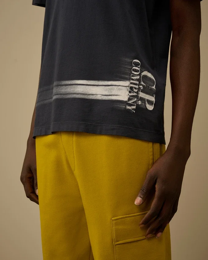 Chemise à manches courtes en jersey 24/1 avec logo sur le bas