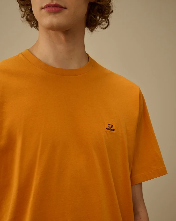 Chemise à manches courtes en jersey 30/1 avec écusson logo