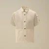 Chemise à manches courtes en popeline de coton U16 avec Lens et boutons