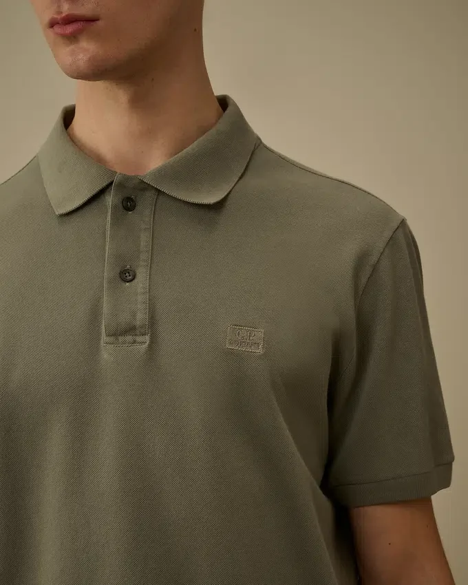 Polo à manches courtes en piqué 24/1 teint à la pigmentation