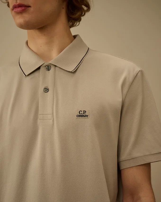 Polo à manches courtes en piqué stretch avec logo