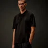 Polo à manches courtes et demi-zip en jersey mercerisé de la Metropolis Series