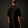 Polo à manches courtes et demi-zip en jersey mercerisé de la Metropolis Series