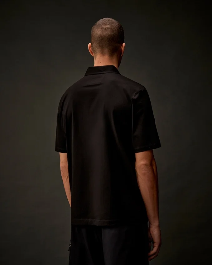 Polo à manches courtes et demi-zip en jersey mercerisé de la Metropolis Series