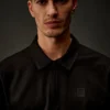 Polo à manches courtes et demi-zip en jersey mercerisé de la Metropolis Series