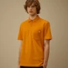 Polo à manches courtes et poche poitrine en piqué extensible
