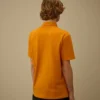 Polo à manches courtes et poche poitrine en piqué extensible