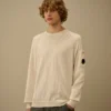 Pull à col rond et manches raglan en coton/nylon avec des motifs Lens