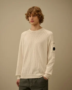 Pull à col rond et manches raglan en coton/nylon avec des motifs Lens