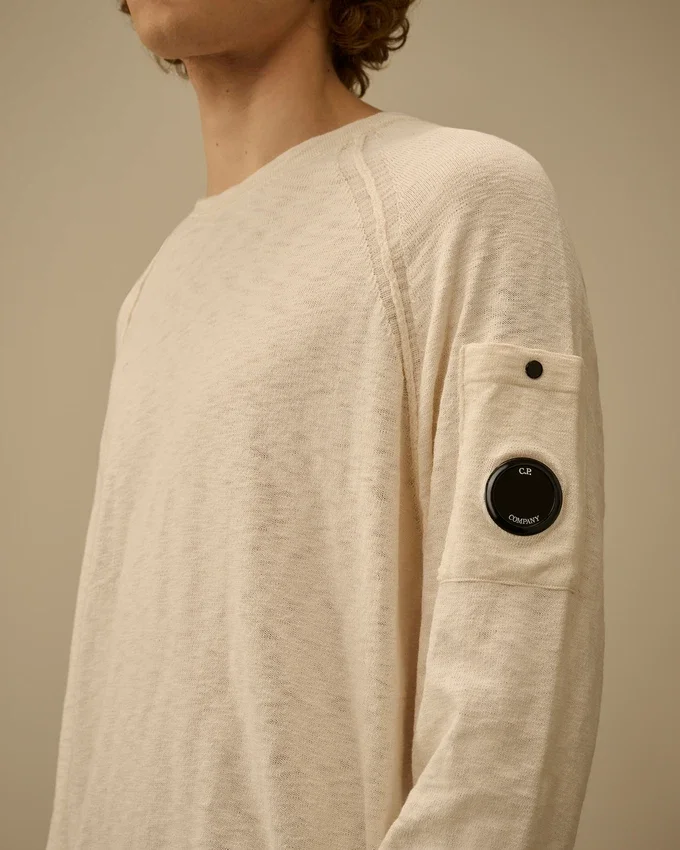 Pull à col rond et manches raglan en coton/nylon avec des motifs Lens