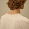 Pull à col rond et manches raglan en coton/nylon avec des motifs Lens
