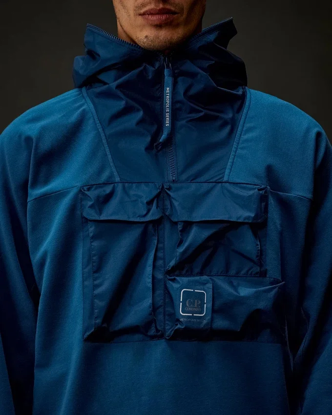 Sweat à capuche mi-zippé en polaire stretch de la Metropolis Series
