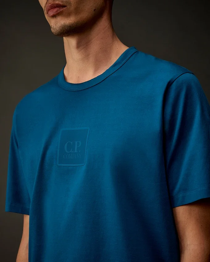 T-shirt à manches courtes en jersey mercerisé de la collection Metropolis Series avec écusson caoutchouté